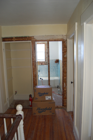 wls, const, 19, entrance to the bathroom walled in and original entrance restored 